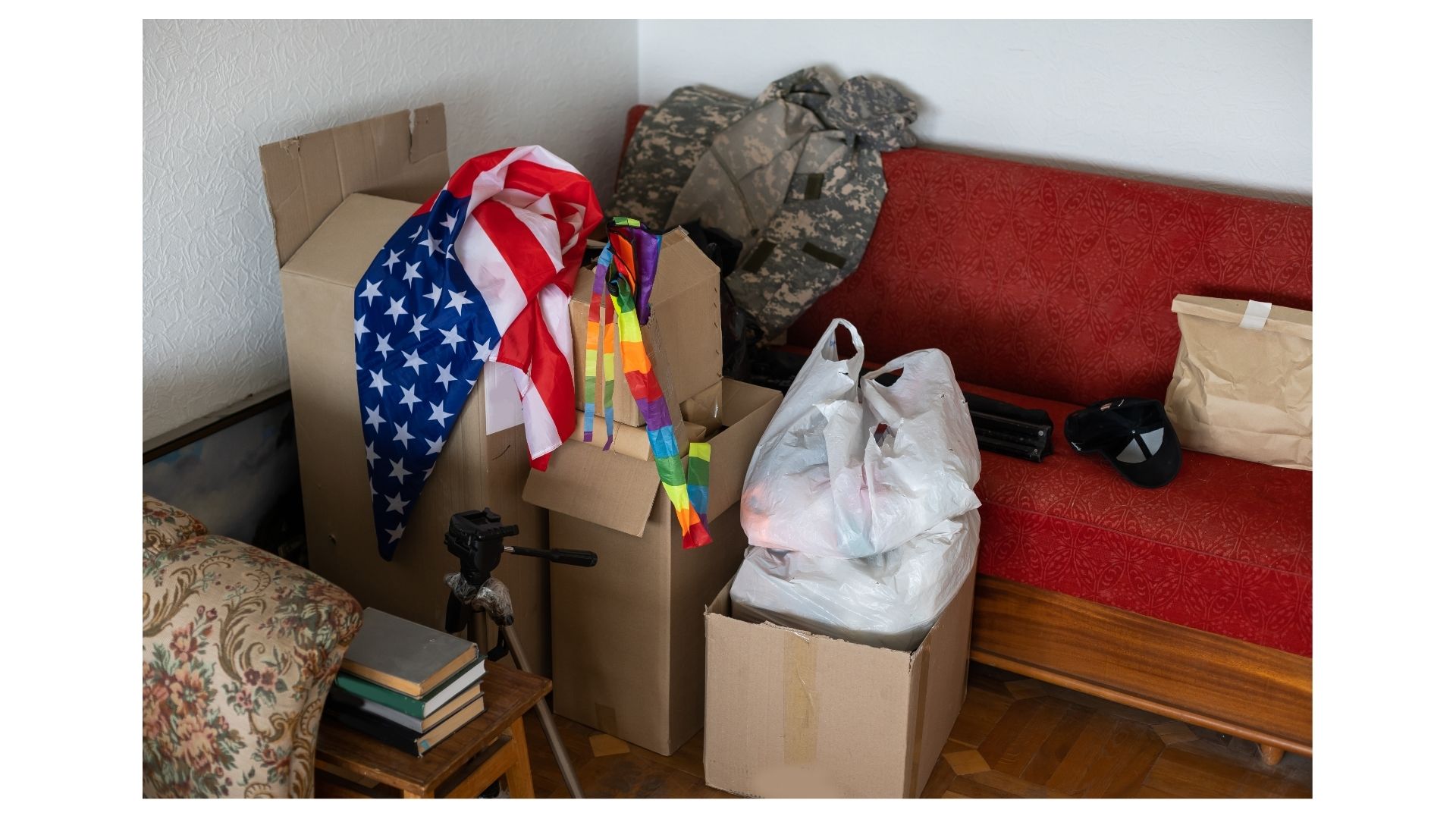 Military PCS Movers San Antonio — packed boxes, American flag, and military gear ready for a Joint Base San Antonio PCS move
