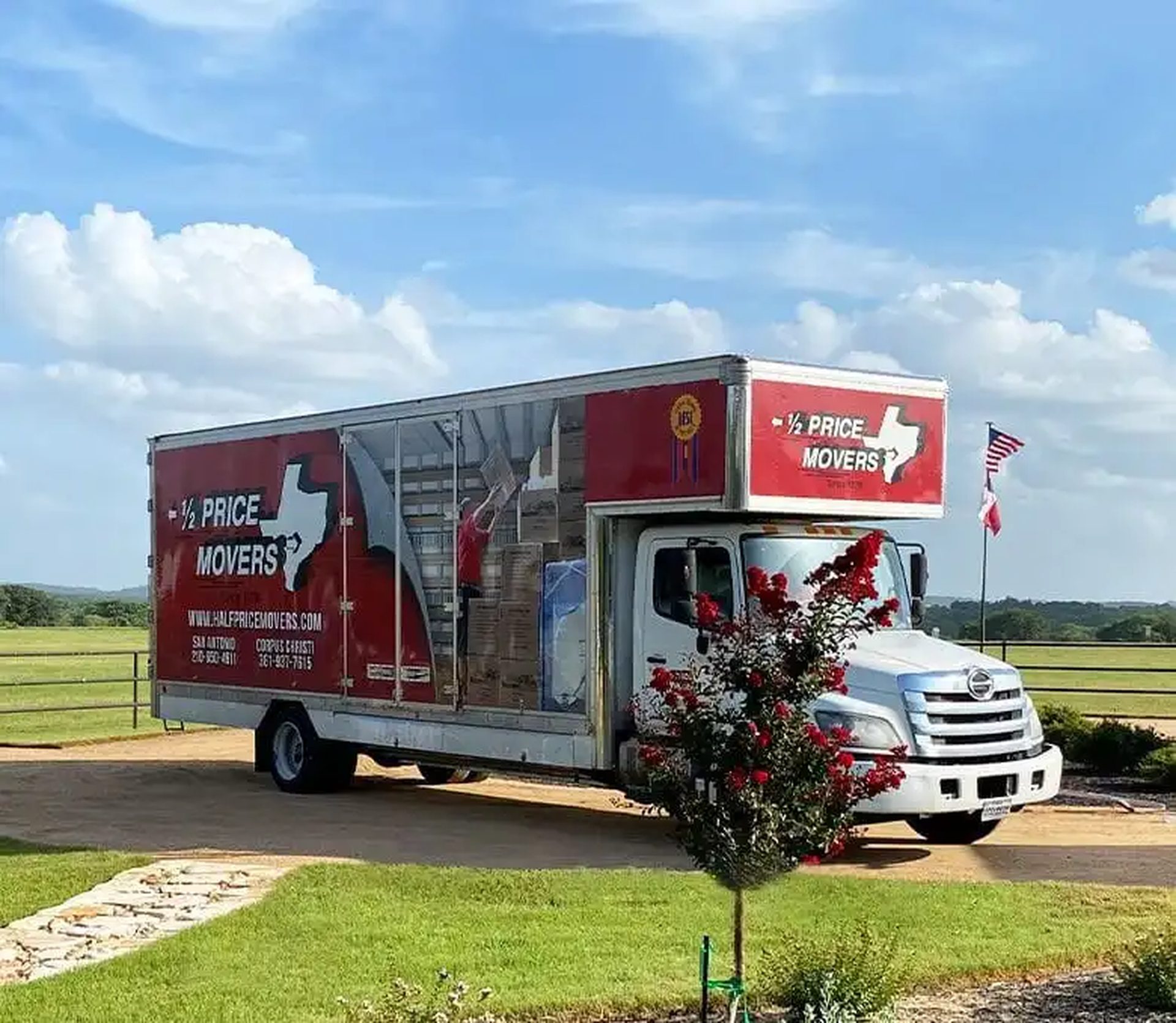 Verify a licensed Texas mover — Half Price Movers branded truck showing legitimate licensed Texas moving company