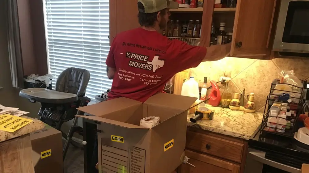 Half Price Movers crew loading a truck